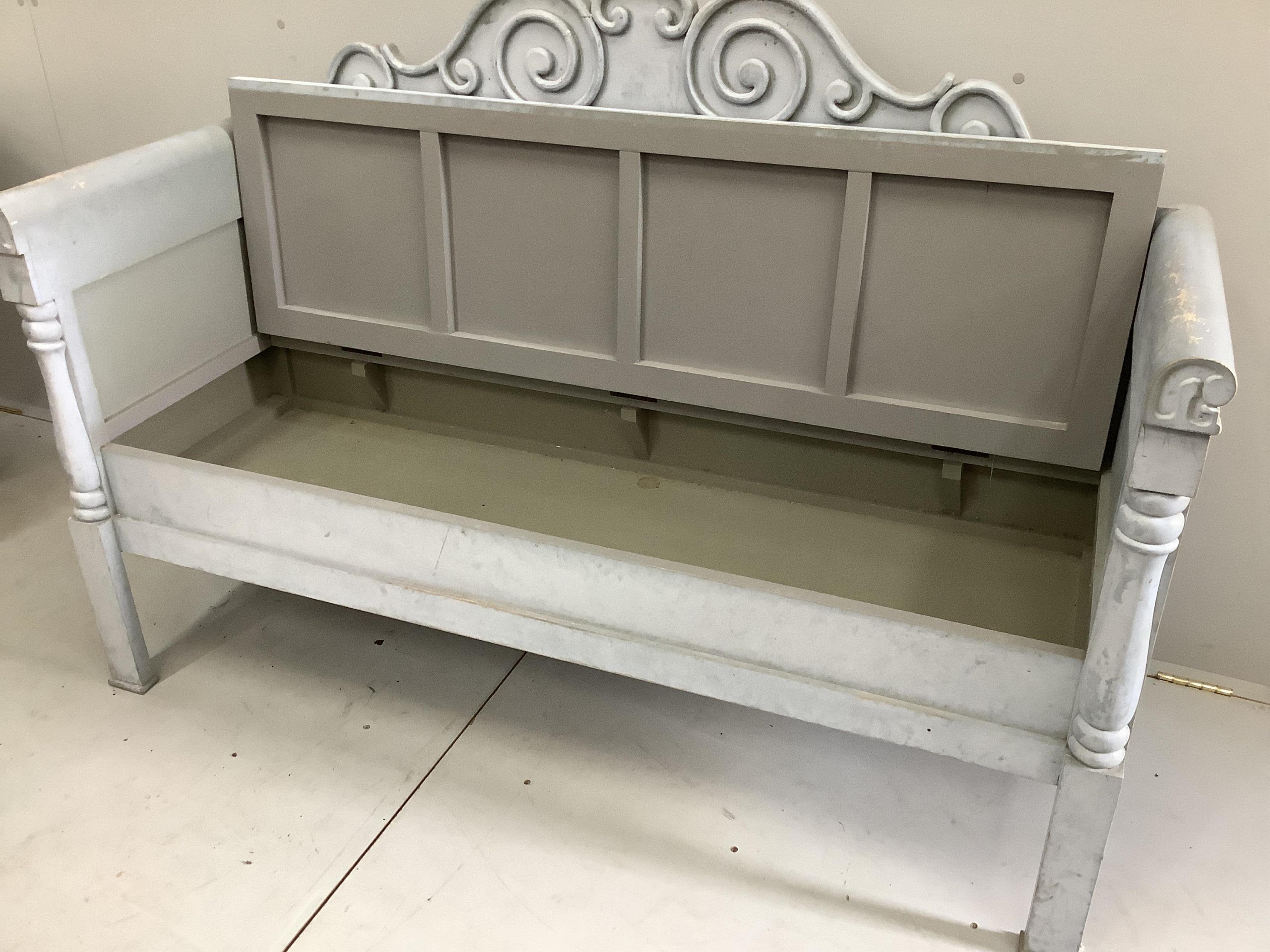 A Gustavian style painted hinged top hall seat, width 146cm, depth 50cm, height 102cm. Condition - fair